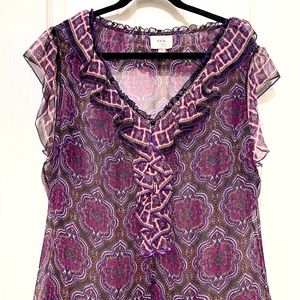 SOLD.—- Cute purple mixed print top
